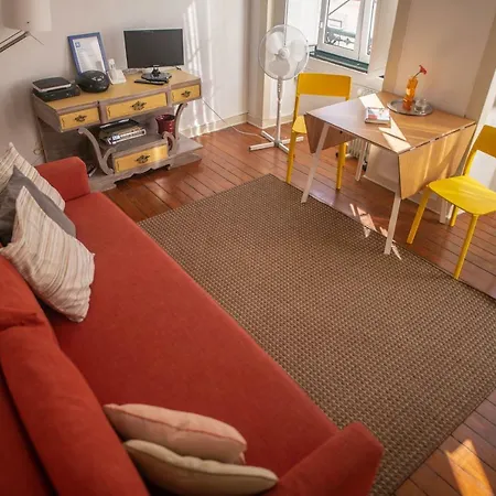 The Blue House - Bica Yellow Tram *